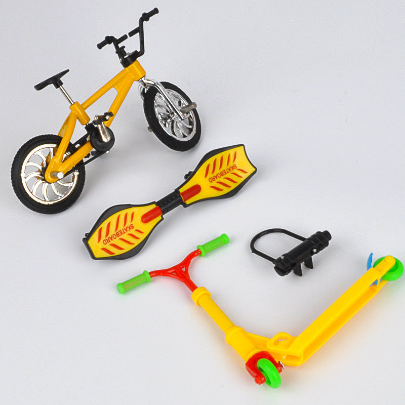 Set med fingercykel och fingerskateboard och fingerkick