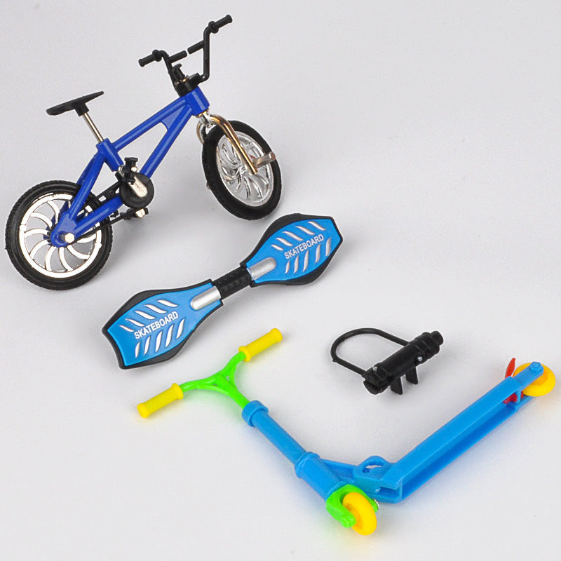 Set med fingercykel och fingerskateboard och fingerkick