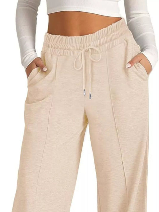 Vida byxor med dragsko och fickor för kvinnor