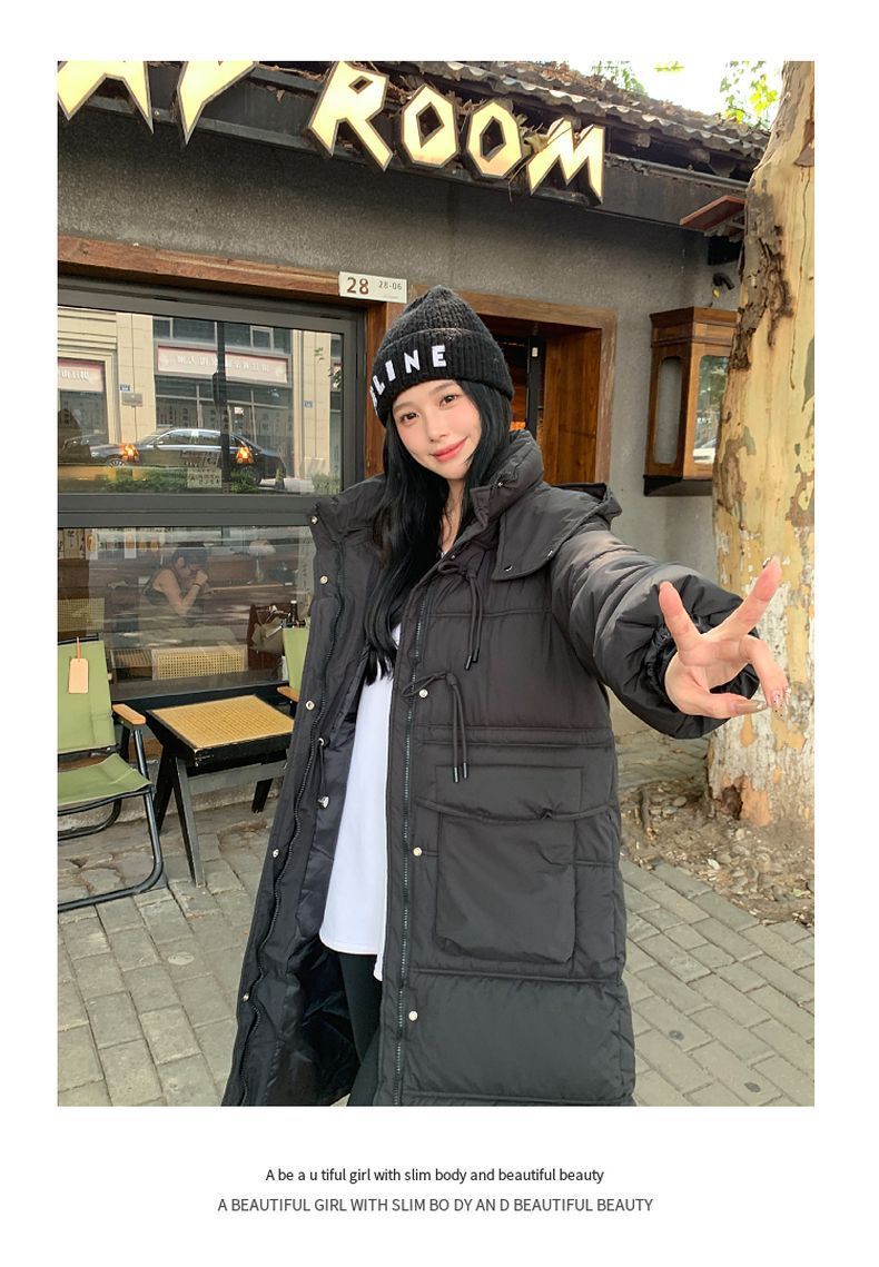 Lång vadderad vinterjacka med huva