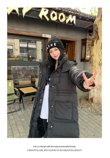 Lång vadderad vinterjacka med huva