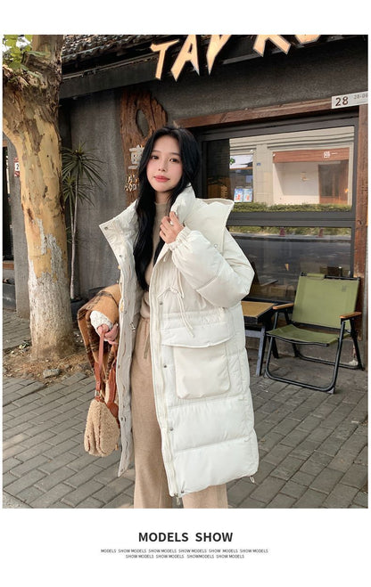 Lång vadderad vinterjacka med huva