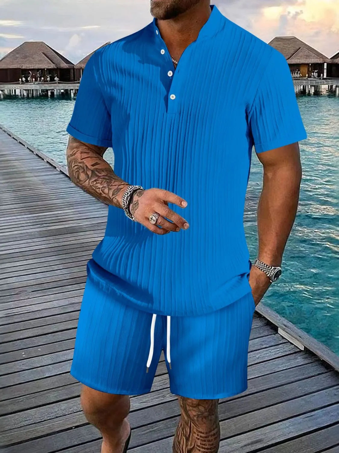 Herrset med kortärmad knapptopp och matchande shorts – finns i flera färger