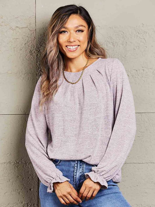 Tröja med volangärmar och rund hals i lila – dam